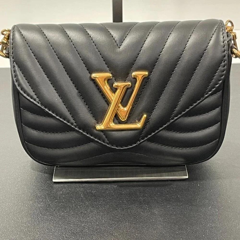 Louis Vuitton Pochette New Wave Leather Handbag (JB1126)